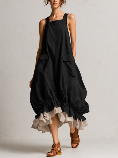 Vestido midi negro abullonado, sin mangas, con bolsillos grandes y dobladillo de volantes en capas