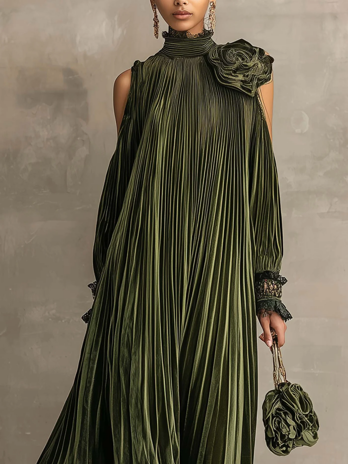 Vestido maxi verde oliva plisado con detalle floral en el hombro